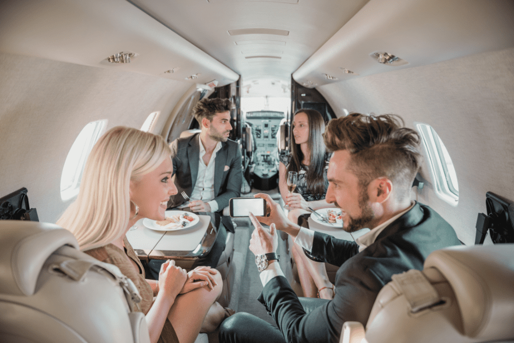People inside private jet having a nice time and talking